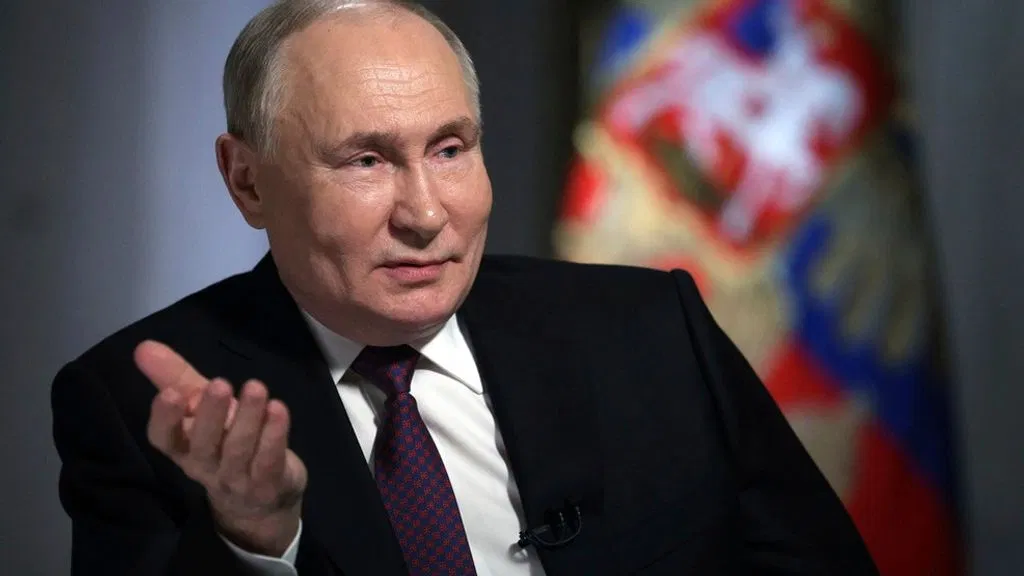 Russian President Vladimir Putin speaks during an interview with Rossiya Segodnya International Media Group Director General Dmitry Kiselev, in Moscow, Russia, Tuesday, March 12, 2024. (Gavriil Grigorov, Sputnik, Kremlin Pool Photo via AP)