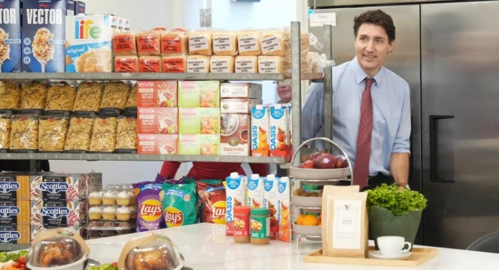 Prime Minister Justin Trudeau arrives to make an announcement regarding a two-month suspension of GST on selected goods, at Vince’s Market, a grocery store in Sharon, Ontario, on Nov. 21, 2024. (Chris Young/Canadian Press)